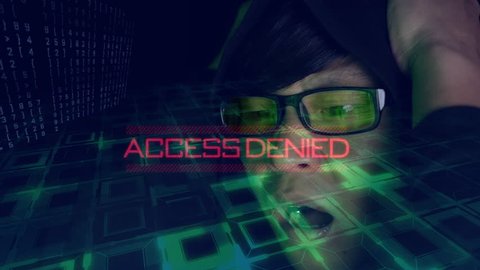 Asian Hacker wearing glass access denied to computer system 