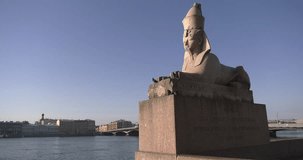 4K high quality video of sunrise in Saint Petersburg, beautiful vintage architecture in city center, sphinxes statues monuments at Neva River embankment of the Russia's northern capital