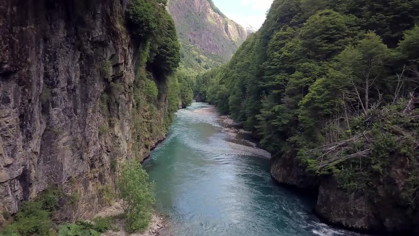Aerial Drone footage of Fly Fishing in Patagonia in Chile South America the best Outdoor Wilderness River Waterfall rapids fishing valley summer travel adventure tourism