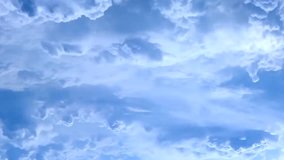 Dense Fluffy Puffs of White Cloud sky moving slowly and transform shape by wind blue sky, time lapse, 1920x1080, FHD,30 FPS.