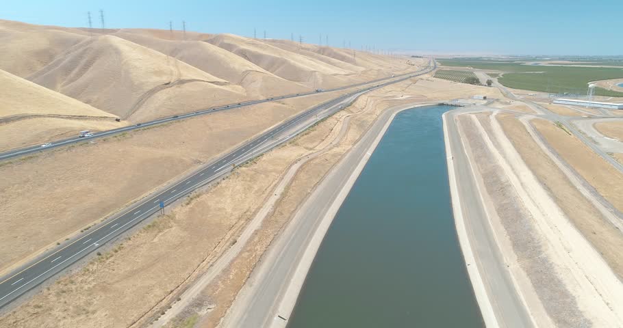 The California Aqueduct Canal running through the central valley of California. Part of the Central Valley Project. USA.