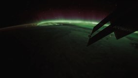 Planet Earth and Aurora Borealis seen from Space Station. Beautiful Planet Earth observed from space. Elements of this video furnished by NASA.