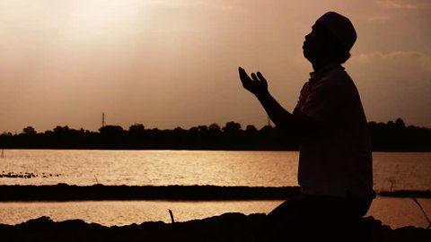 Muslim men are praying for blessings from God footage slow motion
