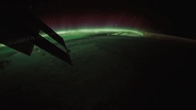 Planet Earth and Aurora Borealis seen from Space Station. Beautiful Planet Earth observed from space. Elements of this video furnished by NASA.