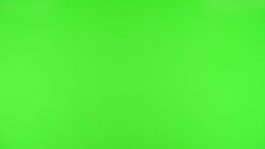 Young chinese doctor man on green chroma key background worried and overwhelmed, forgetful, realize something, expression of shock at having made a mistake Royalty-Free Stock Footage #1017614554
