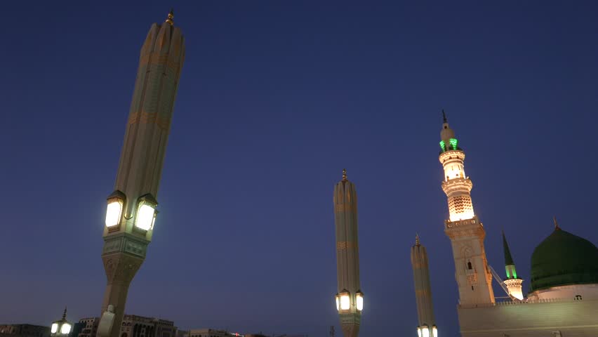 Nabawi mosque during sunrise golden hour - pan shots left to right. Royalty-Free Stock Footage #1017633010