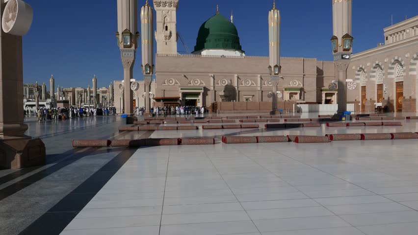 Masjid Al Nabawi or Nabawi Mosque (Mosque of the Prophet) in Medina (City of Lights), Saudi Arabia.Nabawi mosque is Islam's second holiest mosque after Masjidil Haram (in Mecca, Saudi Arabia) Royalty-Free Stock Footage #1017633811