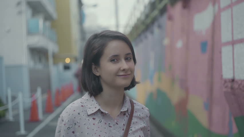 Girl is walking on the street of Tokyo | Shutterstock HD Video #1017635392