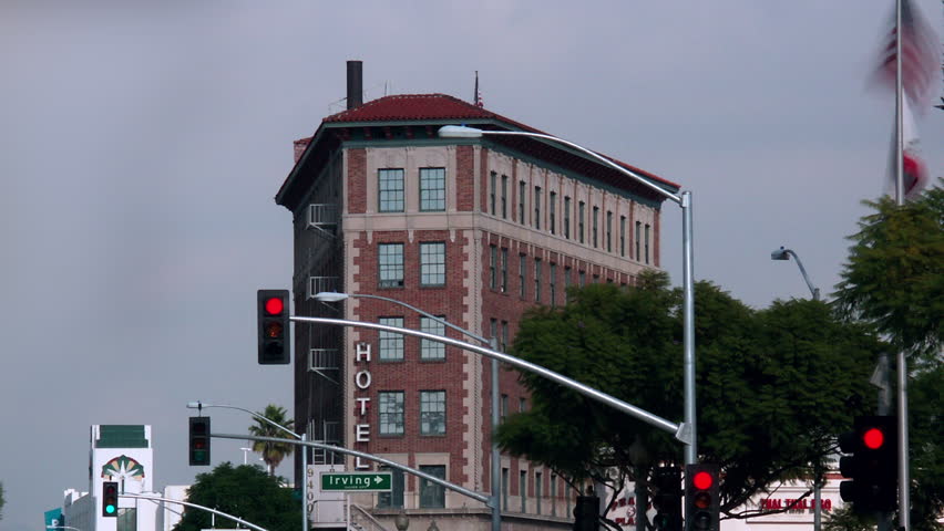 Timelapse tilt down of hotel to traffic Culver City Los Angeles California