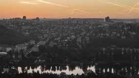 Beautiful high quality sunrise timelapse with zooming panorama of Prague taken from Zvahov hill in Prague, Czech Republic