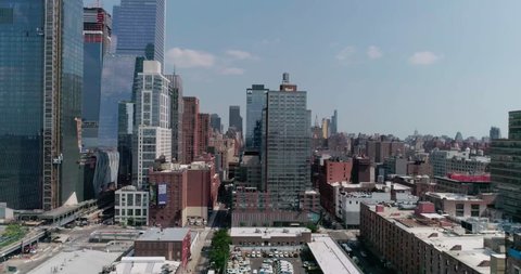 Drone 4K Footage Mid Town West Side NY City Skyline Right To Left Train Yard V2