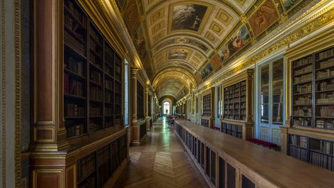 FONTAINEBLEAU, FRANCE - CIRCA JUNE 2018: Interiors and architectural details of library of the Chateau de Fontainebleau timelapse hyperlapse, home of french kings and emperor Napoleon in Fontainebleau