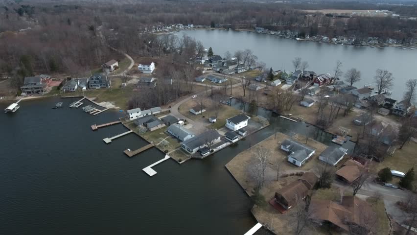 Aerial view of waterfront houses on a lake