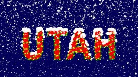 New Year text State Name UTAH. Snow falls. Christmas mood, looped video. Alpha channel Premultiplied - Matted with deep blue RGB(04:00:5B)
