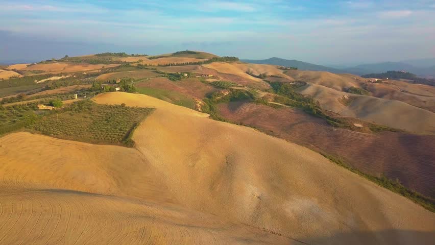 Aerial nature landscape beautiful hills forests fields and vineyards of Tuscany, Italy