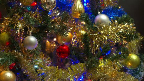 dolly shot Christmas Tree Decorations. 4K. UHD. Dolly shot of decorations on a Christmas tree. 4K. UHD.
