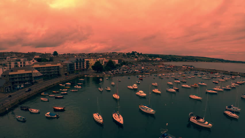 Penzance Harbour, dock at Sunset, boats and yachts and the bridge to the dry dock