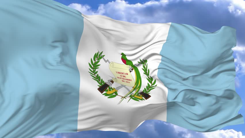 flag waving in the wind against the blue sky Guatemala Royalty-Free Stock Footage #1017711796
