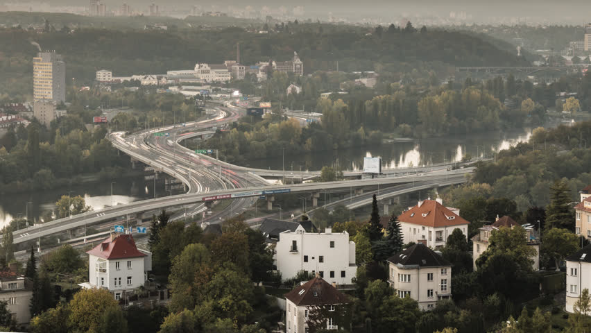 Beautiful high quality timelapse footage of moving traffic during morning rush hour on Barrandov Bridge in Prague, Czech Republic.