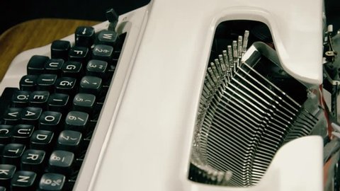 Typing hands on typewriter