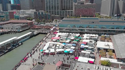 SAN FRANCISCO, CALIFORNIA, USA. 16 JUNE 2018. Aerial of the San Francisco Ferry Building & farmers market, held every Saturday, in the Embarcadero.