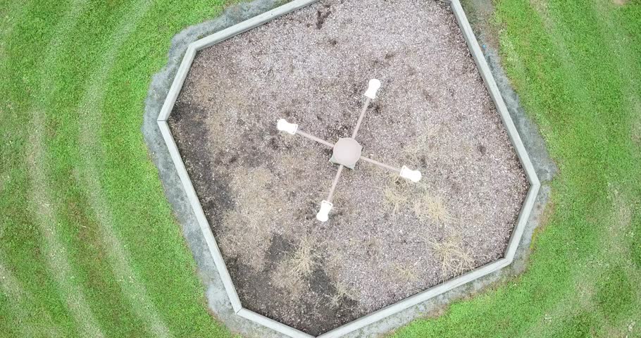 Rotating look down on teeter totter in park