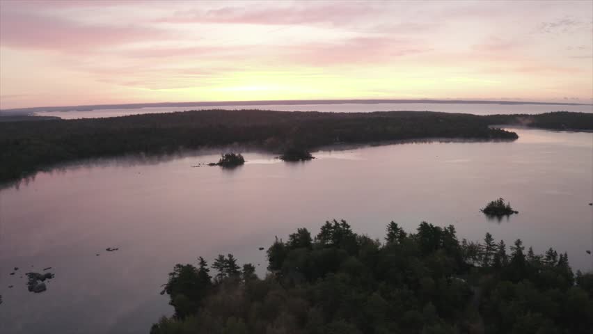Sunrise over lake and woods in Nova Scotia Canada