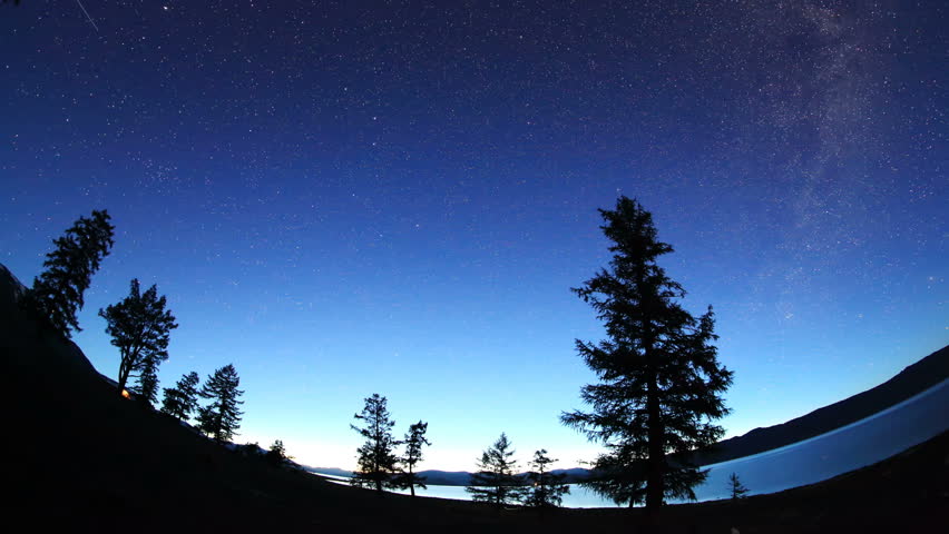 Starry Night over the clouds over the lake Khoton Nuur, Mongolia. Full HD
