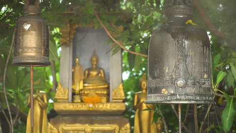 Ancient Bells Hanging in Buddhist Temple