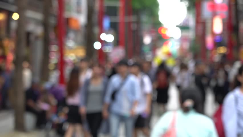 Blurred Locals and tourists walking at the Ximending street market in Taipei, Taiwan, This street is the gathering place for youngster in Taipei. Royalty-Free Stock Footage #1017777304