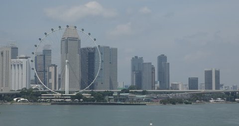 Aerial View Singapore City Skyline Office Skyscrapers and Ferris Wheel Landmark