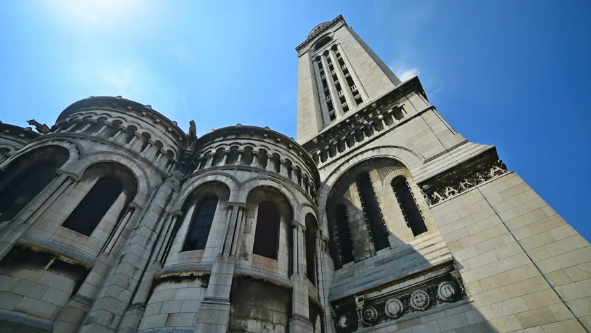 World famous Sacre Coeur cathedral under a shining sun. Paris, France