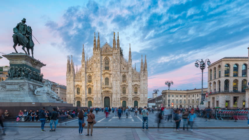 Time Lapse of People at Duomo di Milano or Milan Cathedral in city of Milan The famous Milan Cathedral timelapse hyperlapse (Duomo di Milano) and monument to Victor Emmanuel II on the Piazza del Duomo Royalty-Free Stock Footage #1017788041