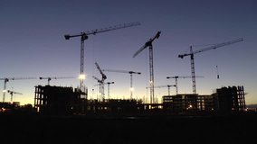 Wide angle FullHD video of building construction at early morning light