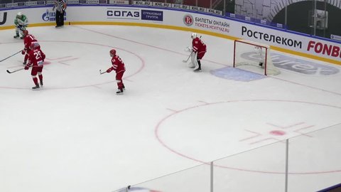 PODOLSK - SEPTEMBER 28, 2018: V. Zharkov (25) and I. Golovkov (11) fight during hockey game Vityaz vs Salavat Yulayev on September 28, 2018 in Podolsk, Russia