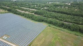 Aerial drone footage video with solar farm in Tinton Falls near Garden State parkway New Jersey