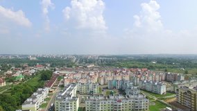 colorful modern high-rise buildings are building for people in the new quarter of the town. Landscape of city. Aerial view