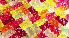 Gummy bear background. Gummy bears as texture. Gum bear candy colorful pattern.