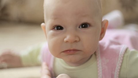 Cute Little Baby Looking Into Camera Stock Footage Video (100% Royalty ...