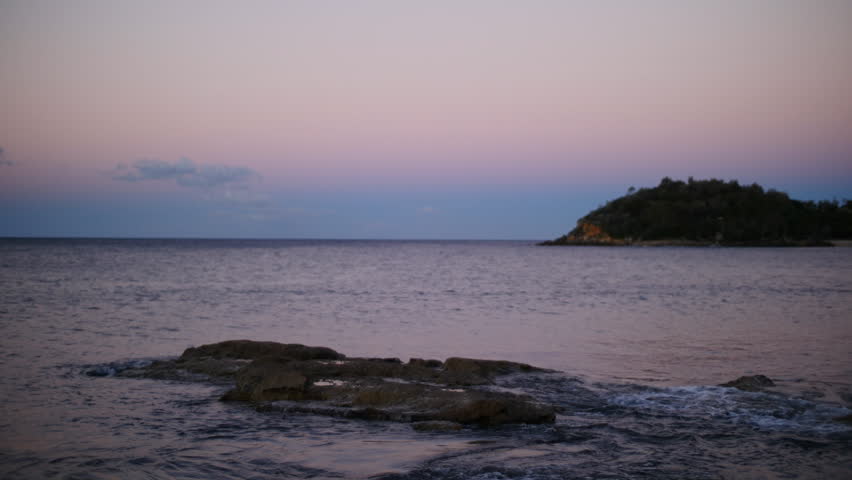 Sunset TL to night over tropical Island. Manly, Sydney, Australia.
