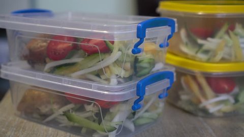 Healthy meal prep containers with chicken and vegetables. Takeaway Food In Plastic Containers 