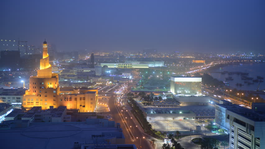 Time Lapse Aerial Doha Skyline Cars Traffic Iconic Spiral Mosque Dusk to Night