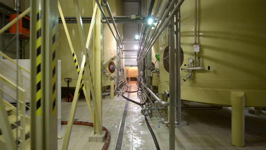 Industrial interior with welded silos angle shot