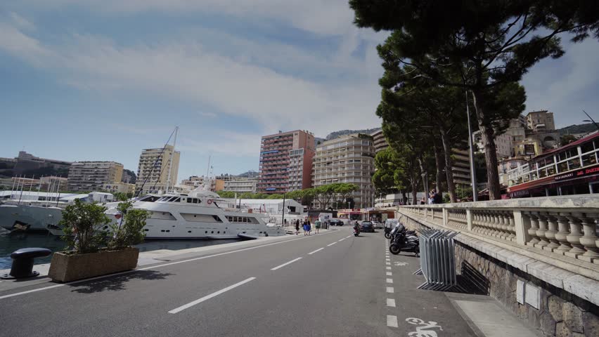 Yachts in sunny Monaco city Monte Carlo town Monte Carlo street