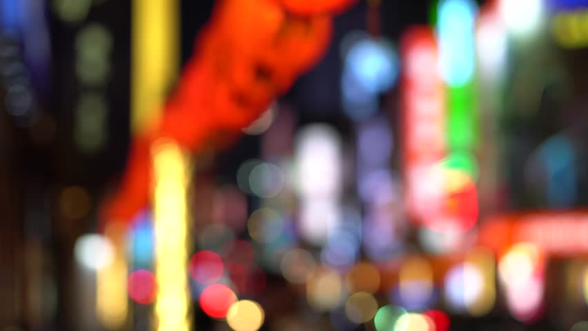 Blurred Nightlife  at Ximending is a neighborhood and shopping in the Wanhua District of Taipei, Taiwan.  Royalty-Free Stock Footage #1017897052