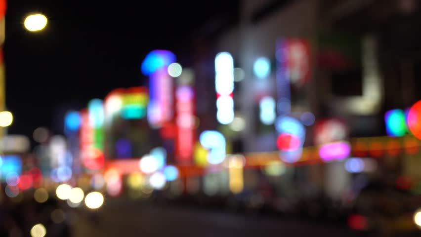 Blurred Nightlife  at Ximending is a neighborhood and shopping in the Wanhua District of Taipei, Taiwan.  Royalty-Free Stock Footage #1017897058