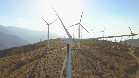 Sustainable Wind Energy Turbines - Aerial drone flyby day