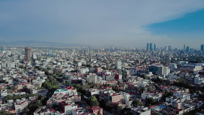 High aerial view of Mexico City. Buildings and buildings. Reforma Skyscrapers at the background