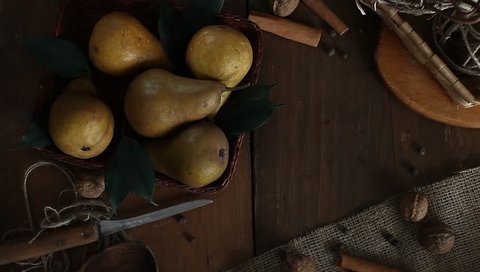 pears on a wooden surface