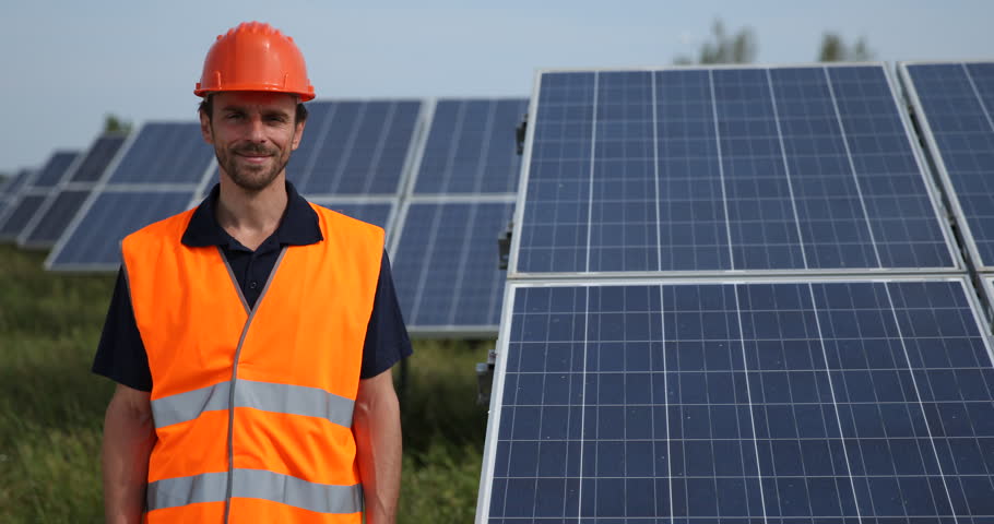 Happy Industrial Worker Man Smile Talking Camera About Solar Panels Power Plant Royalty-Free Stock Footage #1017940483